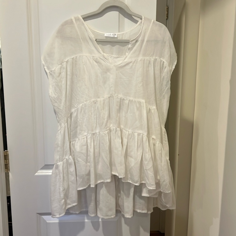 White babydoll shirt with slip shirt underneath